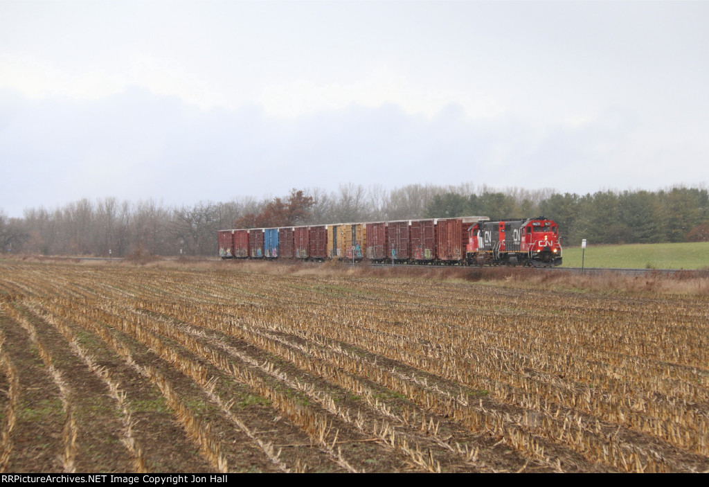 L508 rolls south across the barren late fall fields with 13 cars in tow